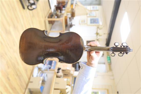 A mid 19th century German violin, bears Nicolas label, cased with a silver mounted bow, back 36cm